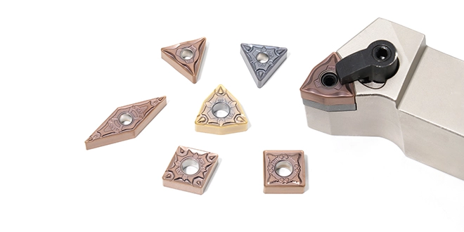 Turning inserts and tool holder